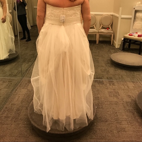 Ivory/champagne Wedding Dress with bustled train. - Picture 6 of 8